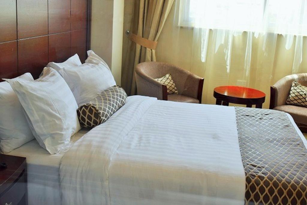 Addissinia Hotel Addis Ababa Quarto foto